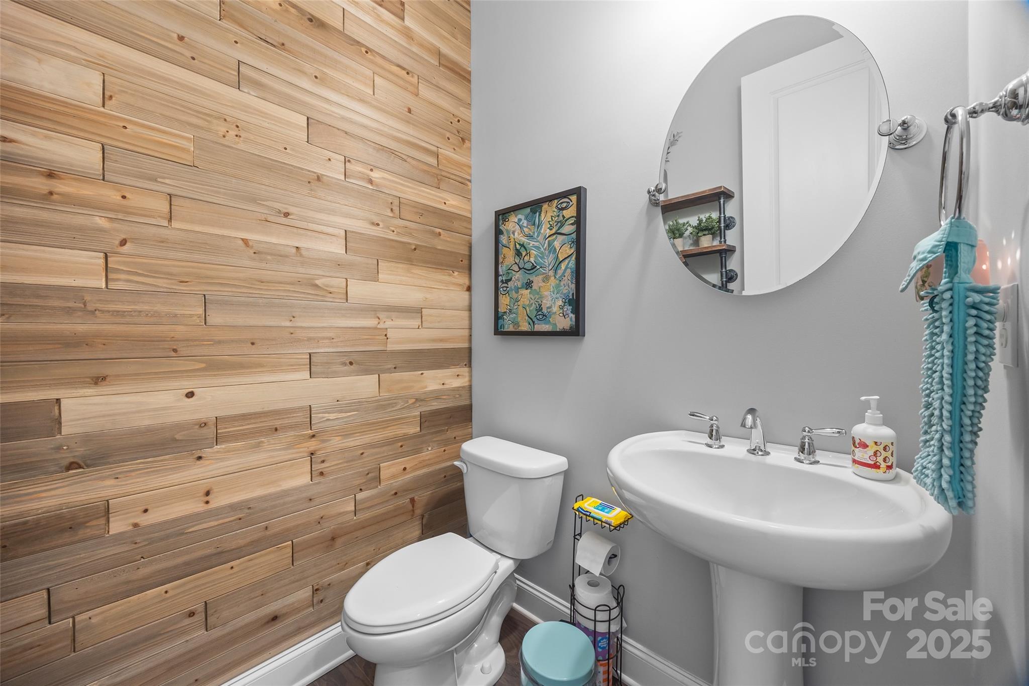 5212 Meadowcroft Way Fort Mill, SC 29708 - Photo 22 of 43 a bathroom with a toilet sink and mirror