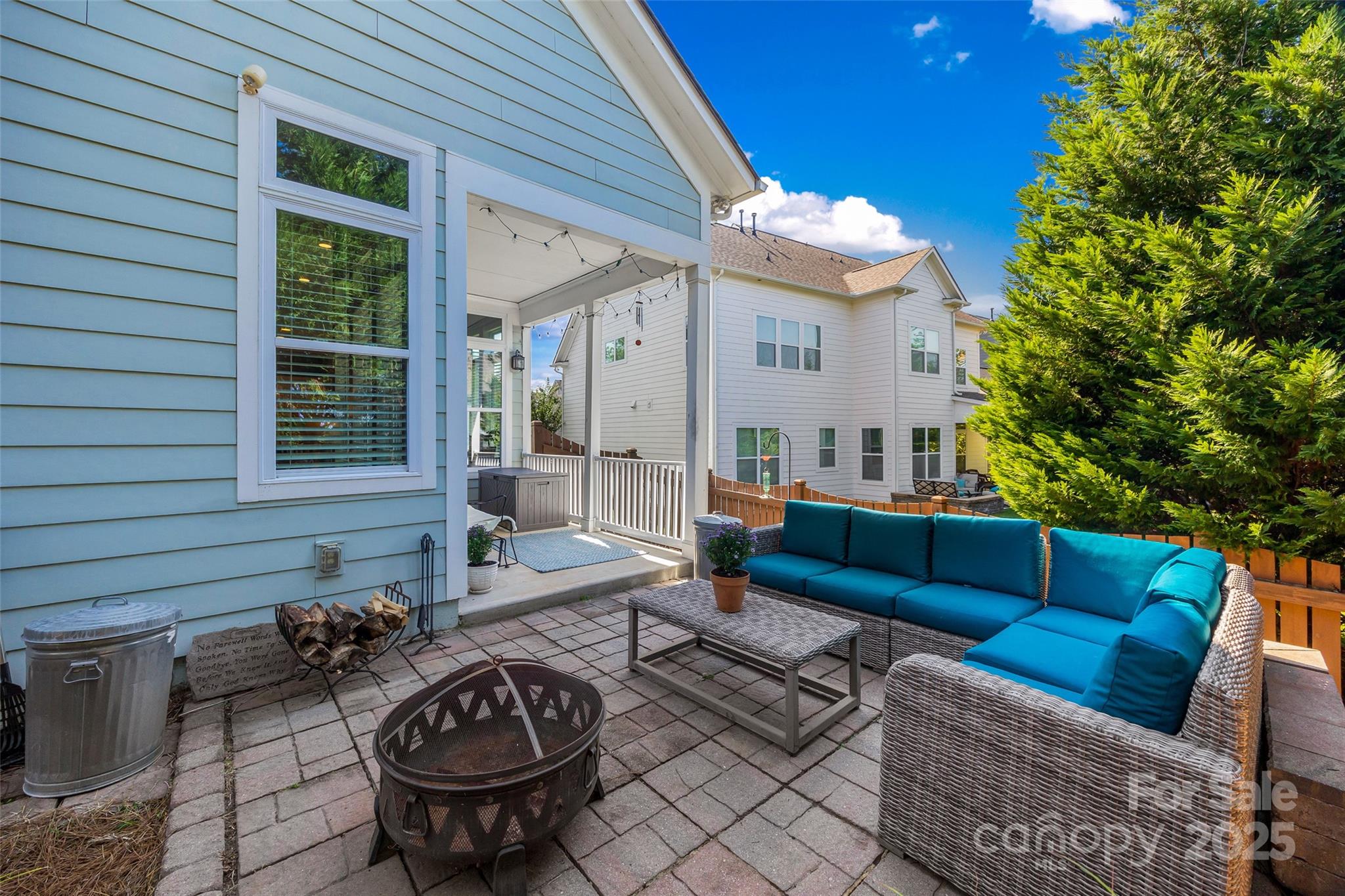 5212 Meadowcroft Way Fort Mill, SC 29708 - Photo 39 of 43 a view of a patio with couches table and chairs and potted plants
