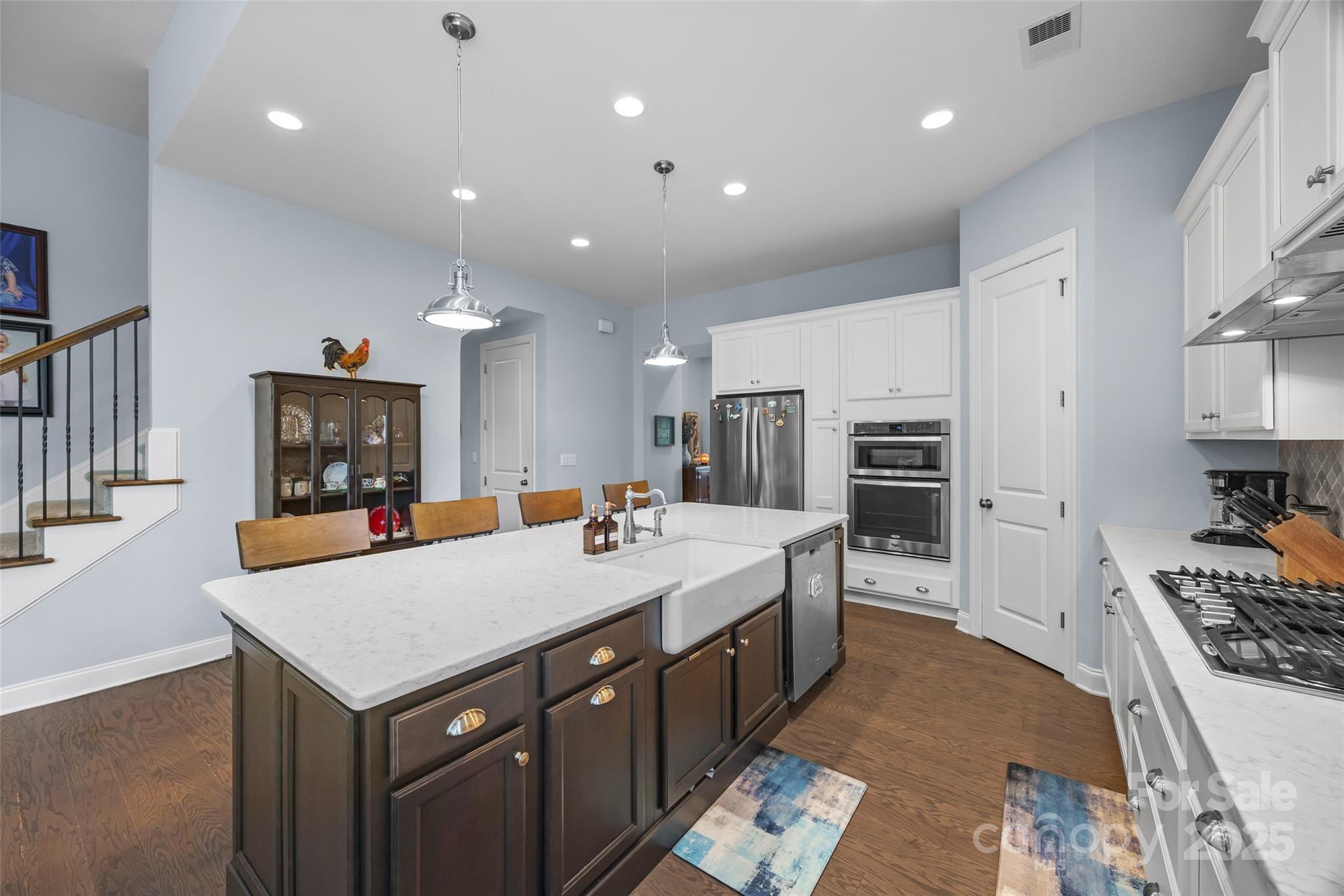 5212 Meadowcroft Way Fort Mill, SC 29708 - Photo 6 of 43 a large kitchen with kitchen island a sink counter space and stainless steel appliances