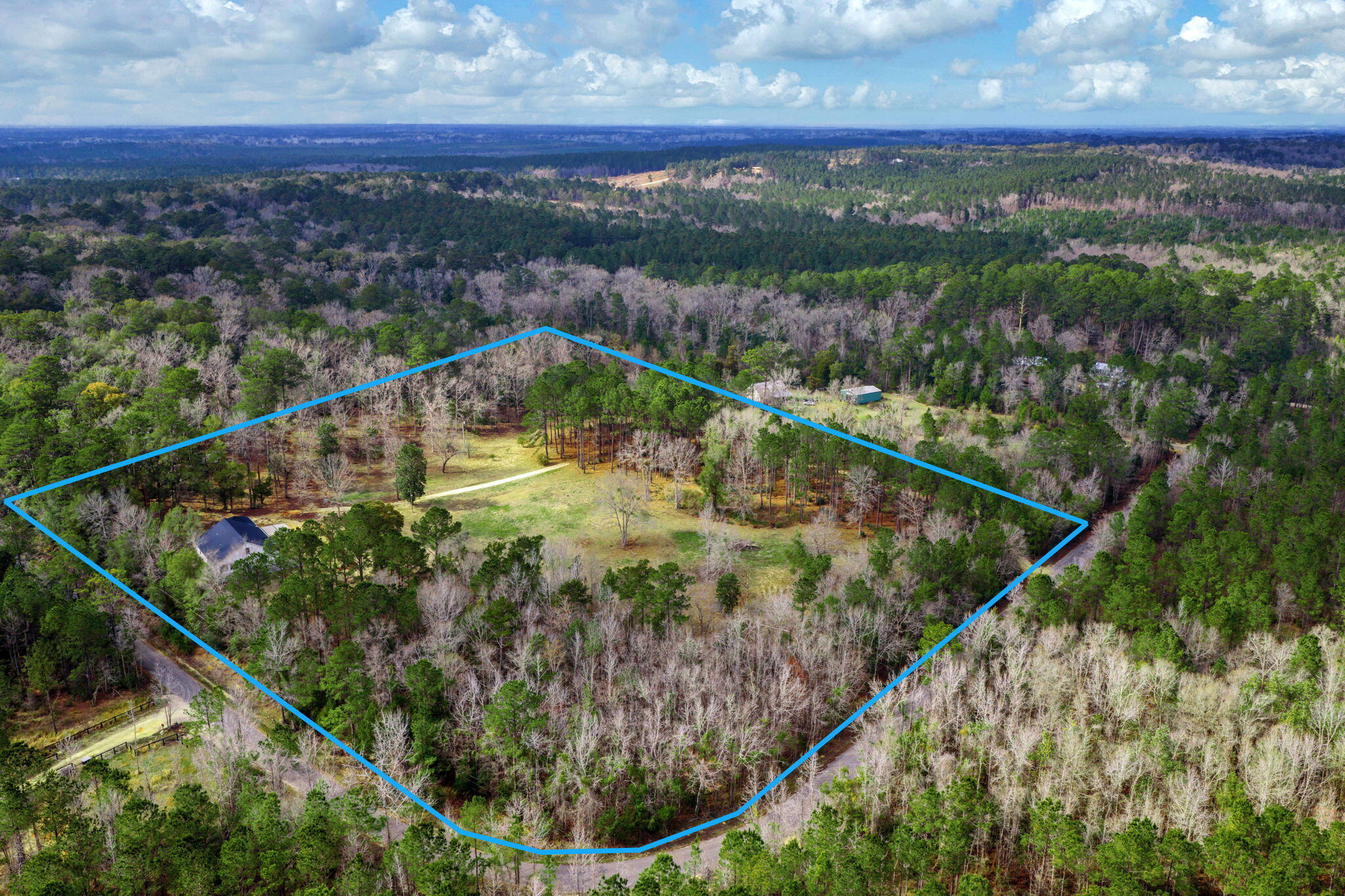 1388 Pusley Hill Road Ponce de Leon, FL 32455 - Photo 2 of 16 a view of a lake from a balcony