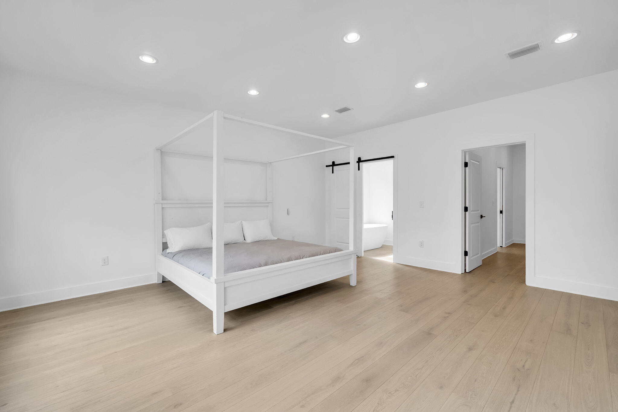 1388 Pusley Hill Road Ponce de Leon, FL 32455 - Photo 3 of 16 a view of an empty room with a cabinet and mirrors