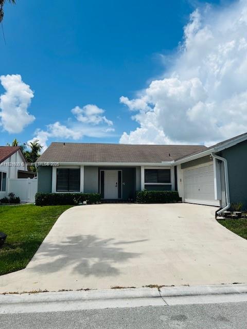 Rainberry Park Boca Raton, FL 33428 - Photo 17 of 17 a front view of house with yard