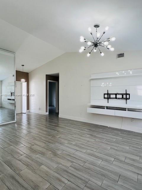 Rainberry Park Boca Raton, FL 33428 - Photo 5 of 17 a view of a kitchen with wooden floor and a ceiling fan