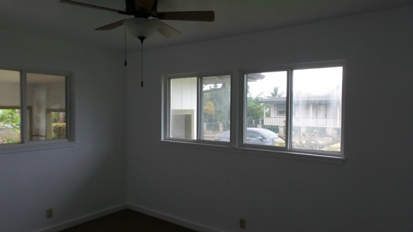 8205 Elepaio Road Kekaha, HI 96752 - Photo 12 of 16 a view of an empty room with a window