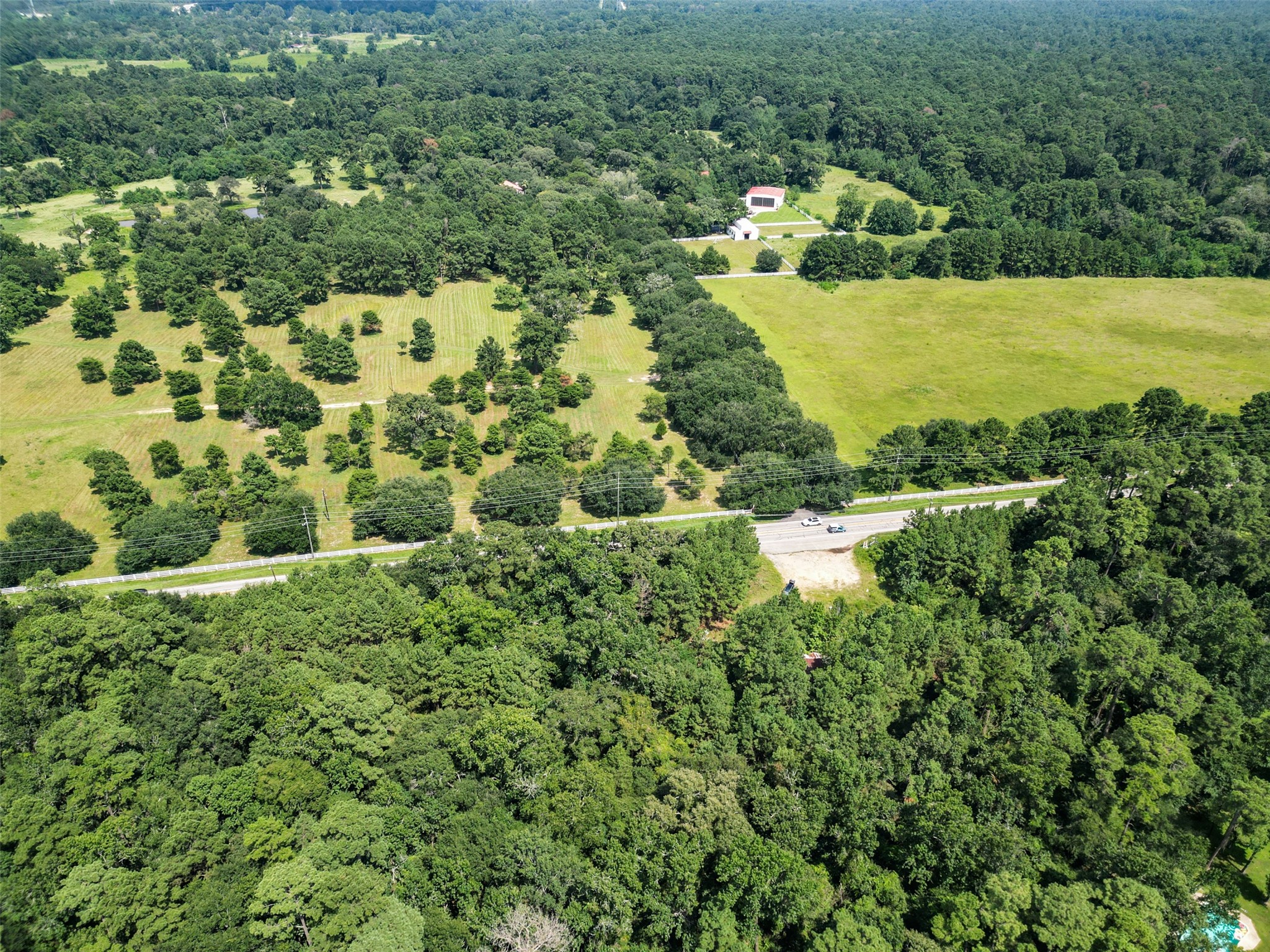37119 Farm To Market 149 Pinehurst, TX 77362 - Photo 7 of 10 a view of a yard with a house