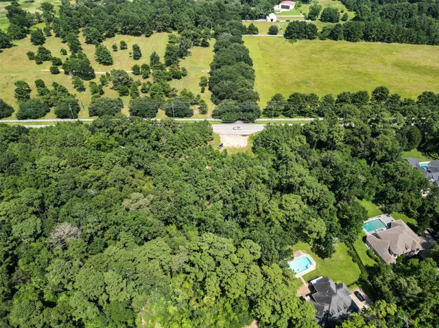 a view of a lake with a building in the background