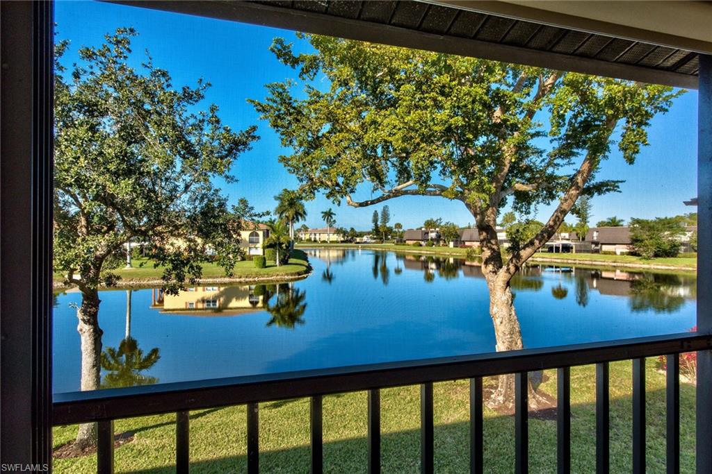a view of a lake from a balcony