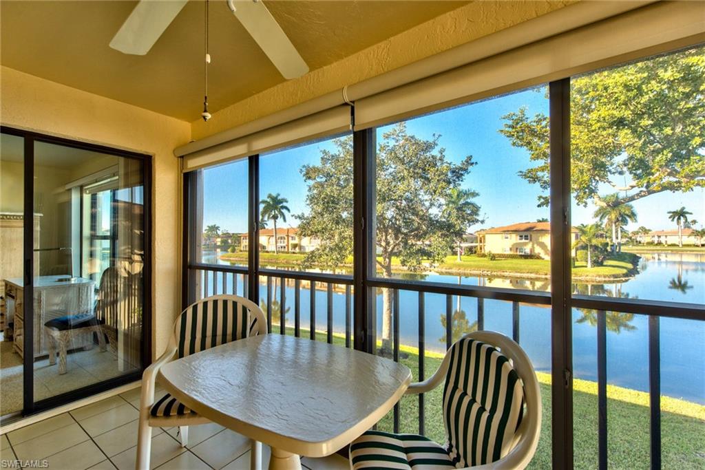 4410 Chantelle Drive, Unit H206 Naples, FL 34112 - Photo 3 of 25 a view of a dining room with furniture window and outside view