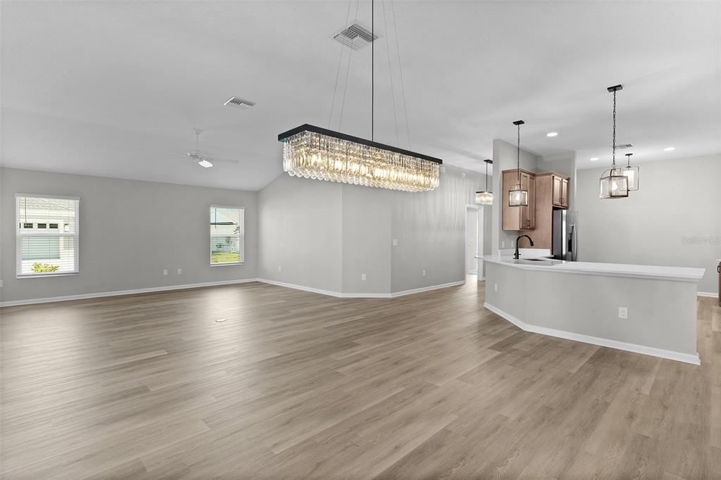 1177 Elkington Road The Villages, FL 34762 - Photo 12 of 59 a view of a kitchen and wooden floor