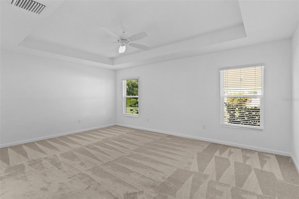 1177 Elkington Road The Villages, FL 34762 - Photo 21 of 59 an empty room with windows