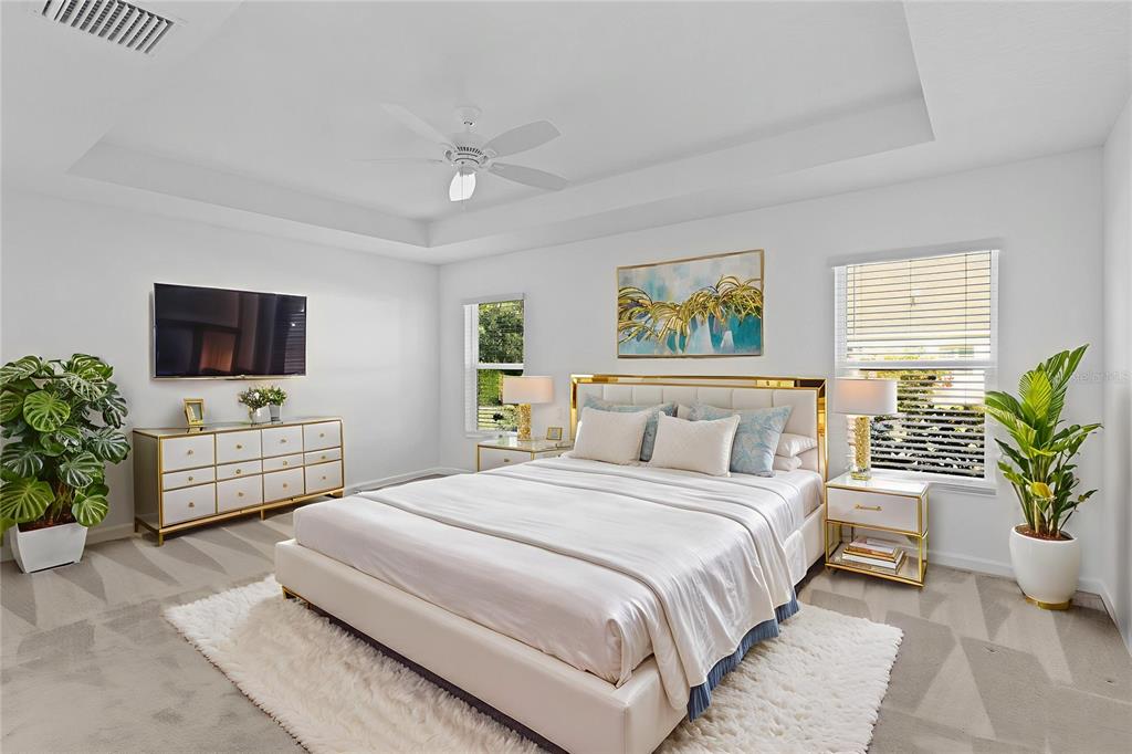 1177 Elkington Road The Villages, FL 34762 - Photo 22 of 59 a bedroom with a bed and a couch