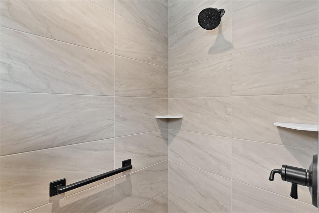 1177 Elkington Road The Villages, FL 34762 - Photo 25 of 59 a bathroom with a shower