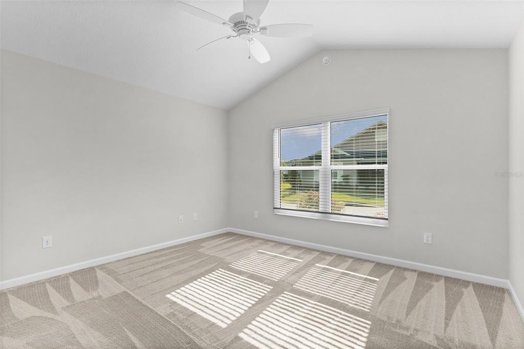 1177 Elkington Road The Villages, FL 34762 - Photo 28 of 59 a view of an empty room with a window