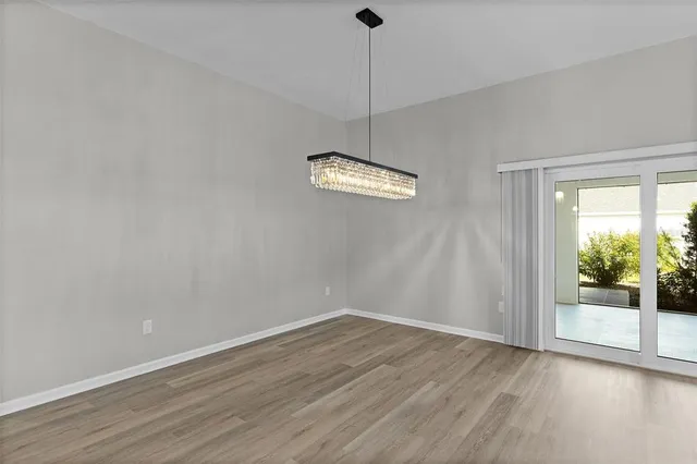 an aerial view of a house with a garden