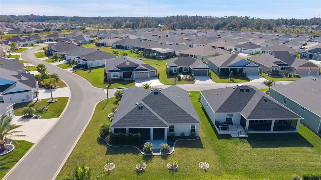 1177 Elkington Road The Villages, FL 34762 - Photo 55 of 59 a aerial view of a house with swimming pool and ocean view