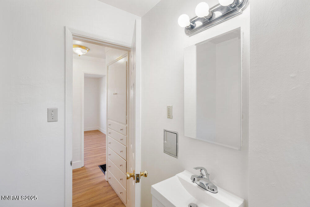 80 Locust Street Reno, NV 89502 - Photo 18 of 49 a bathroom with a sink and a mirror