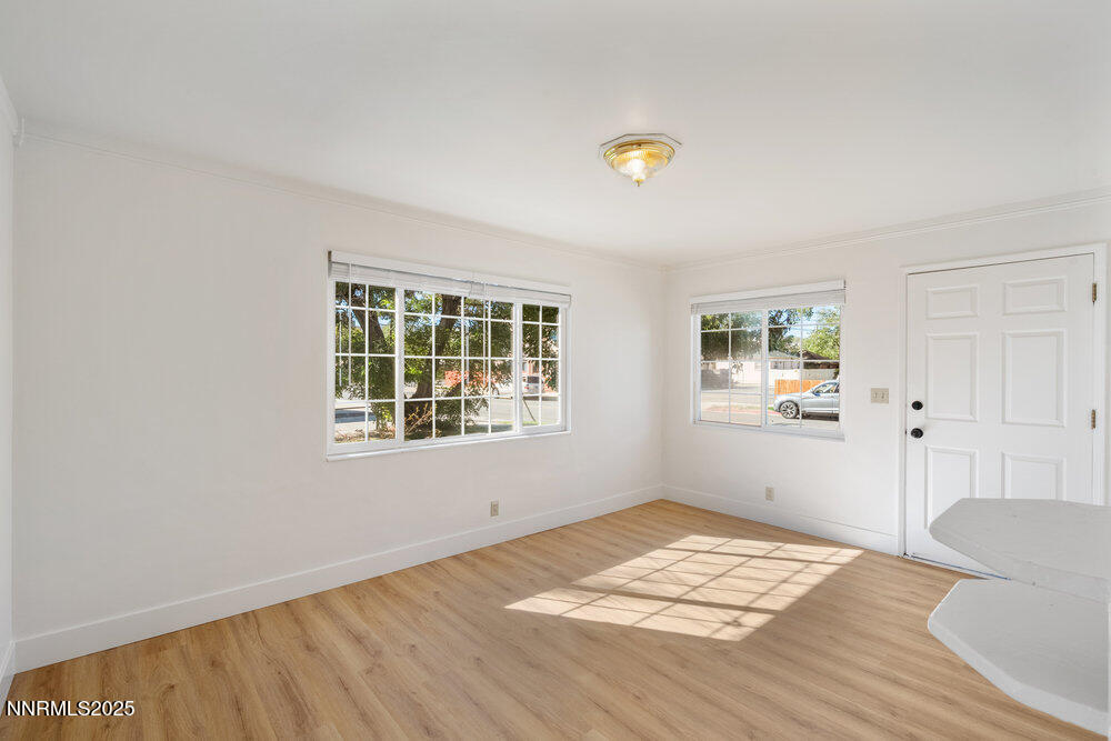 80 Locust Street Reno, NV 89502 - Photo 28 of 49 a view of a room with wooden floor and window
