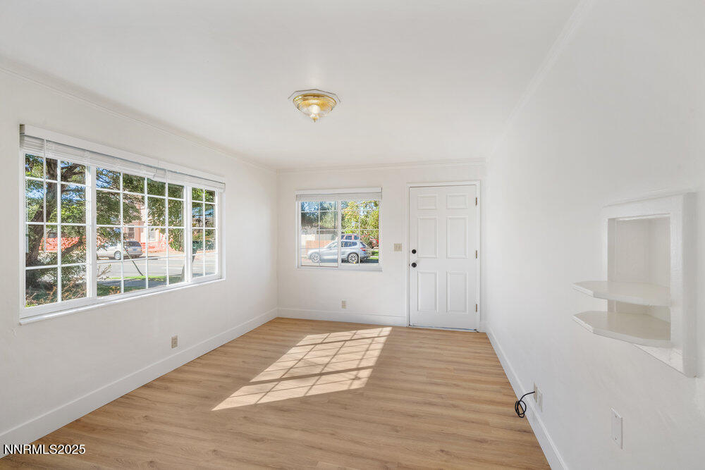 80 Locust Street Reno, NV 89502 - Photo 29 of 49 a view of a room with wooden floor and window