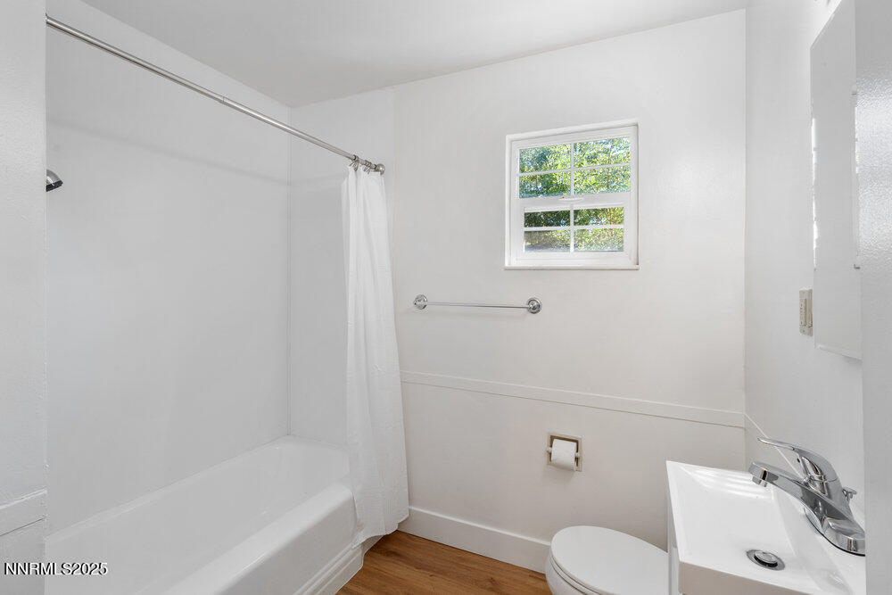 80 Locust Street Reno, NV 89502 - Photo 38 of 49 a bathroom with a sink a toilet and shower