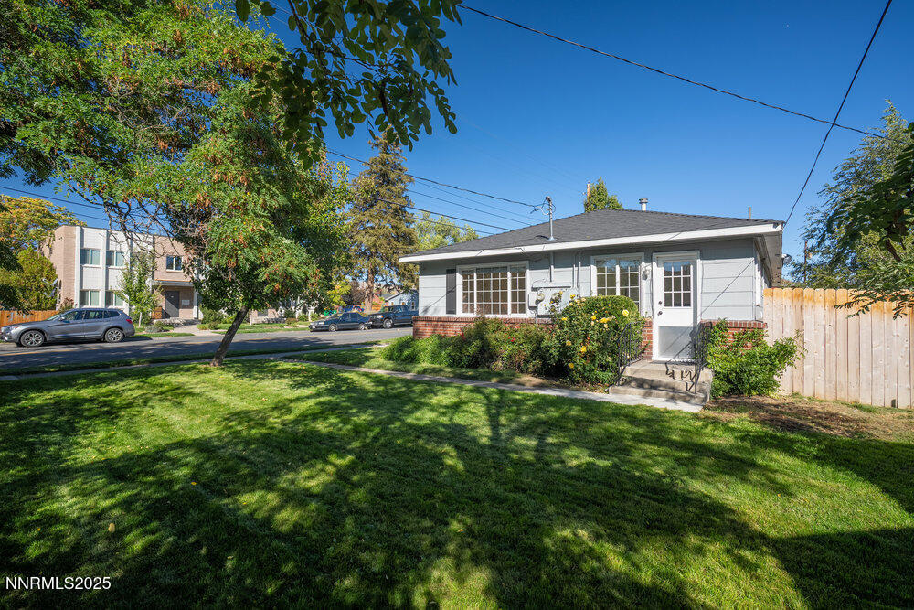 80 Locust Street Reno, NV 89502 - Photo 43 of 49 a front view of a house with a yard