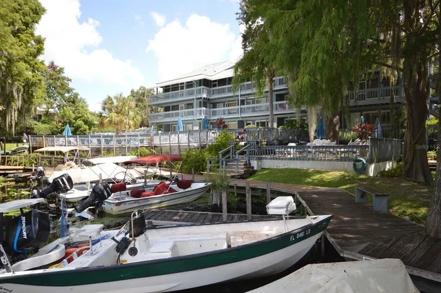 a view of swimming pool with outdoor seating