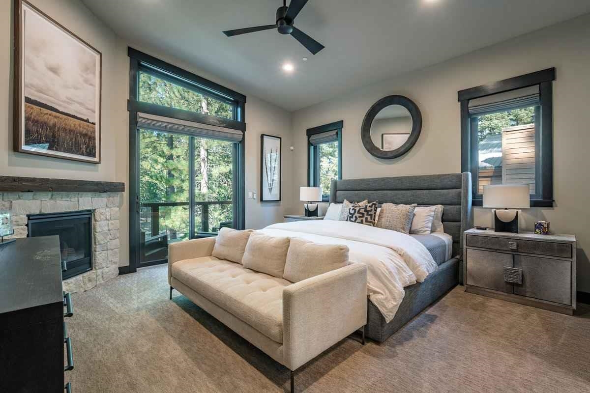 1055 Martis Landing, Unit B Truckee, CA 96161 - Photo 13 of 24 a bedroom with a large bed and a large window