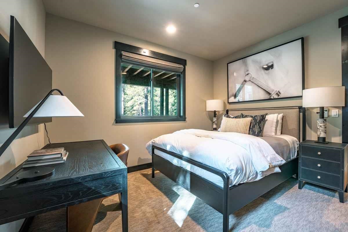 1055 Martis Landing, Unit B Truckee, CA 96161 - Photo 17 of 24 a bedroom with a bed and a night stand
