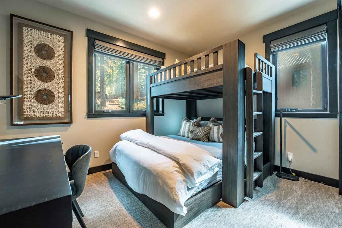 1055 Martis Landing, Unit B Truckee, CA 96161 - Photo 18 of 24 a bedroom with a large bed and a window