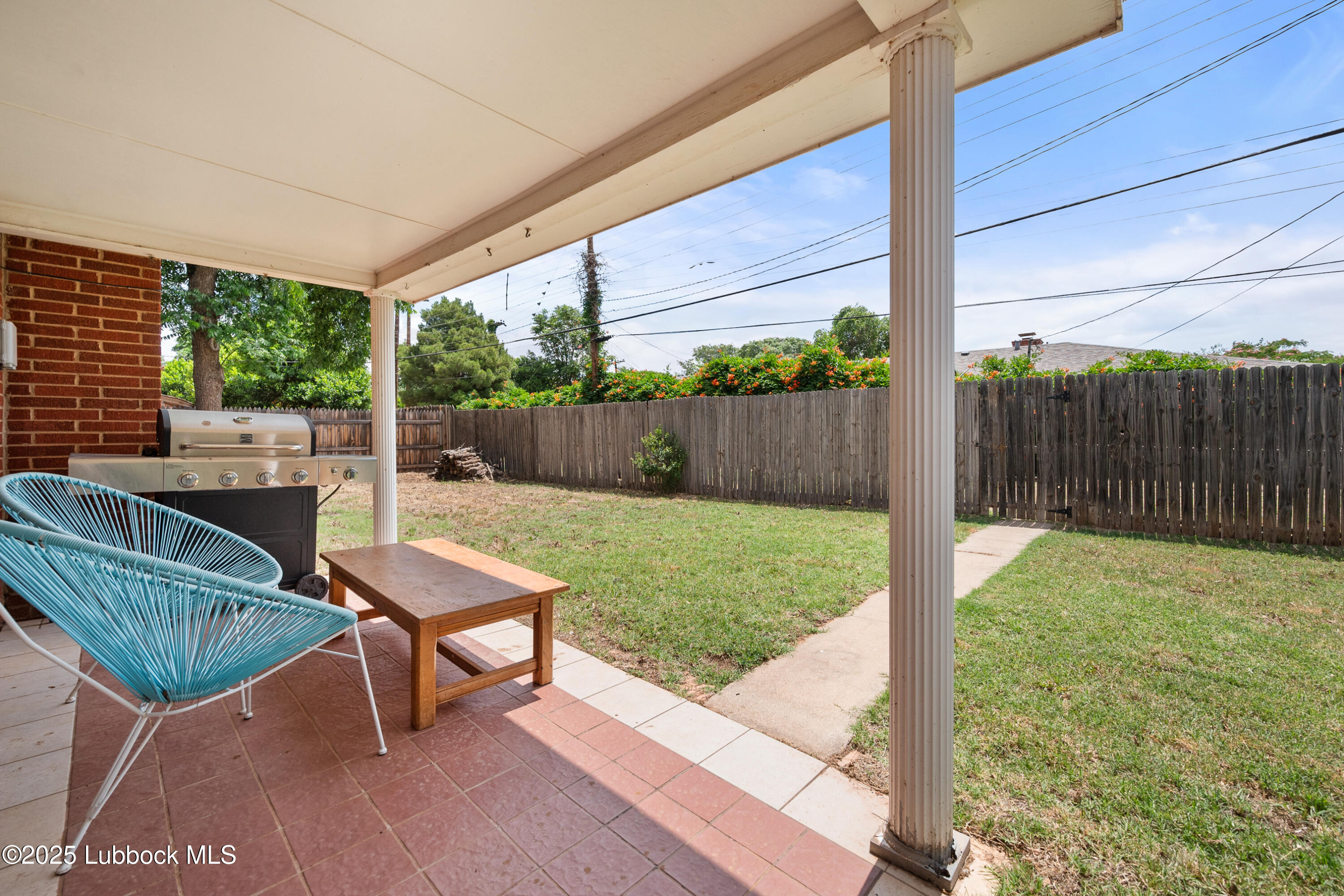 6405 Joliet Avenue Lubbock, TX 79413 - Photo 29 of 30 a backyard of a house with outdoor seating
