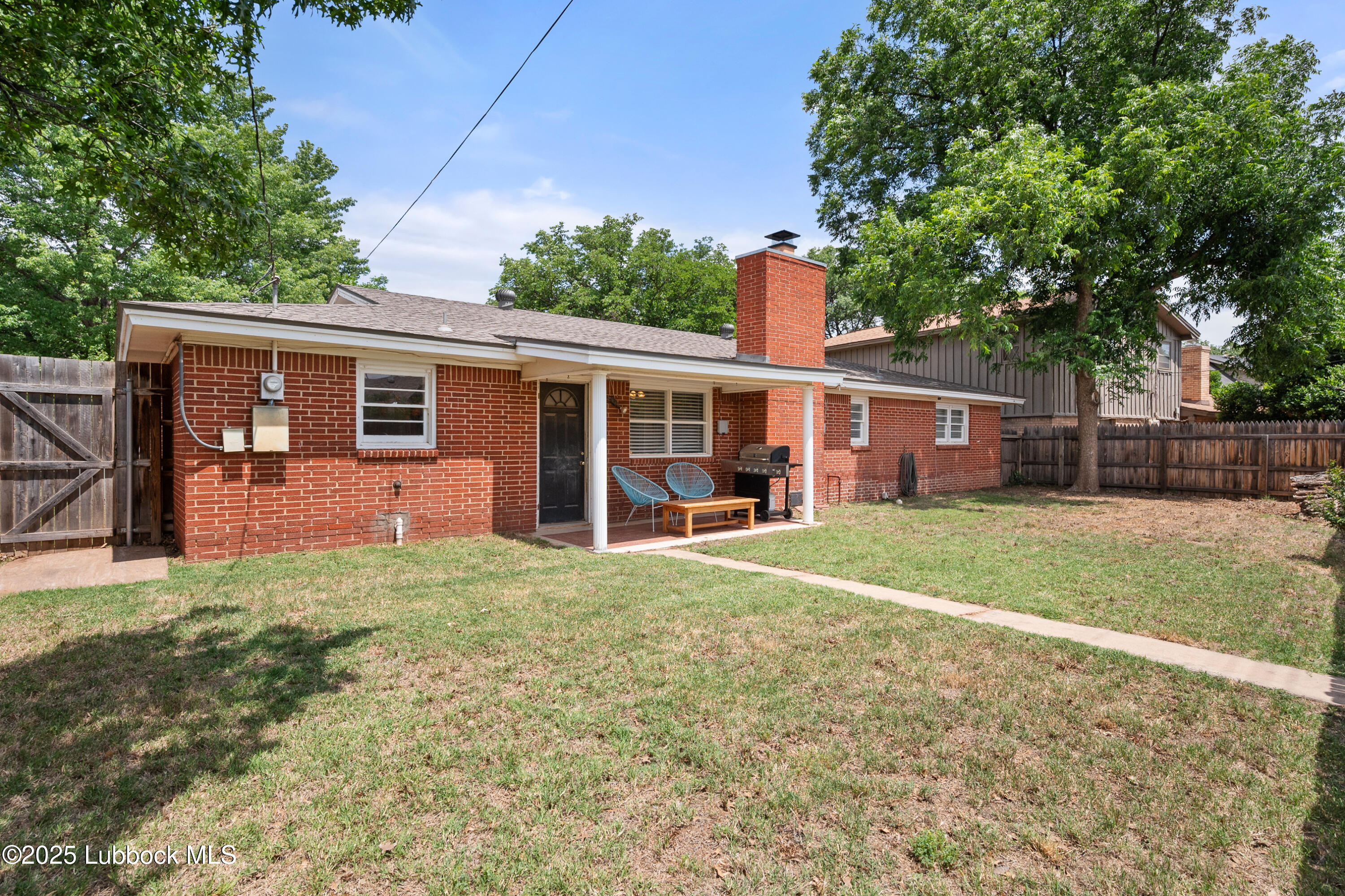 6405 Joliet Avenue Lubbock, TX 79413 - Photo 30 of 30 front view of a house with a yard