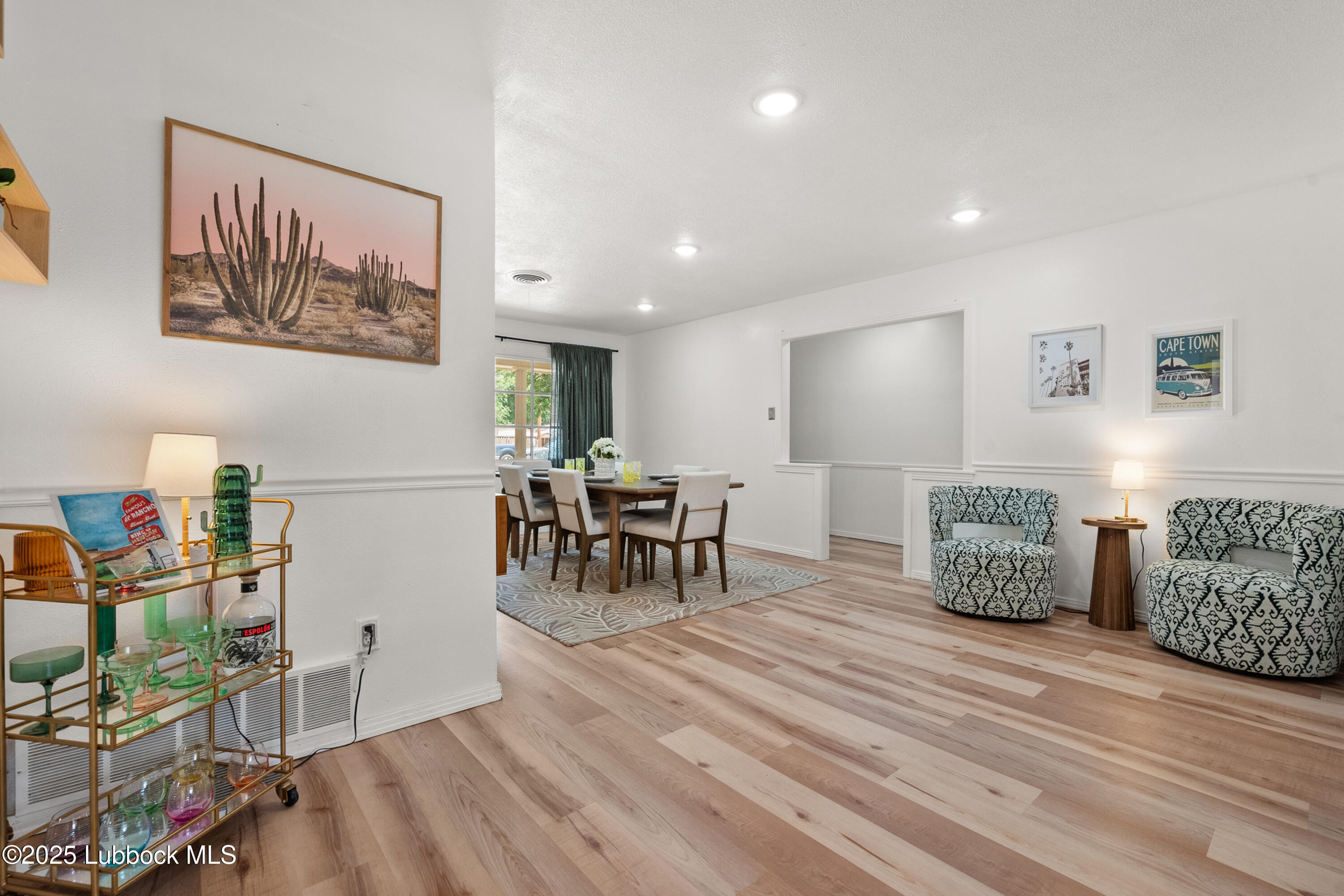 6405 Joliet Avenue Lubbock, TX 79413 - Photo 8 of 30 a living room with furniture and a wooden floor