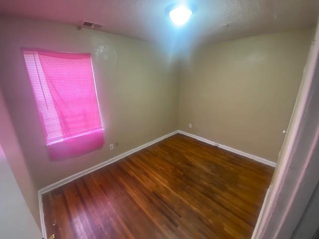 4370 Range Line Road Memphis, TN 38127 - Photo 11 of 14 Empty room with hardwood / wood-style floors