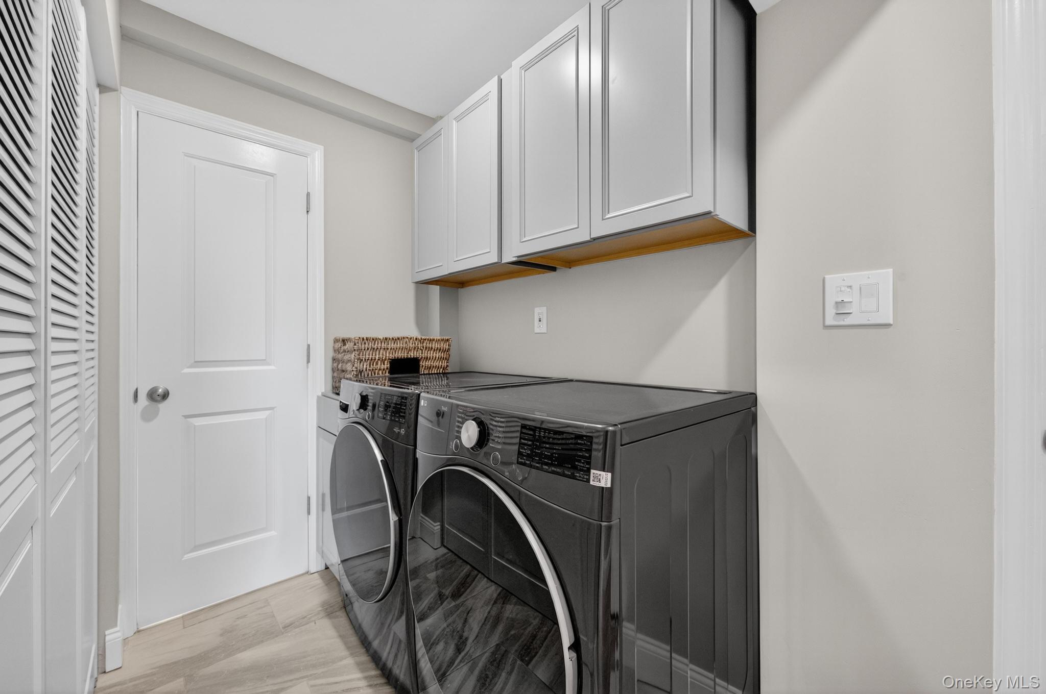 12 Farmstead Road Commack, NY 11725 - Photo 22 of 28 a utility room with dryer and washer