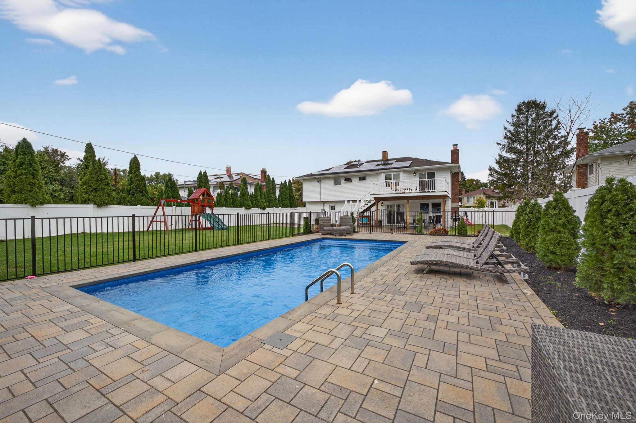 12 Farmstead Road Commack, NY 11725 - Photo 25 of 28 a view of a terrace with sitting area