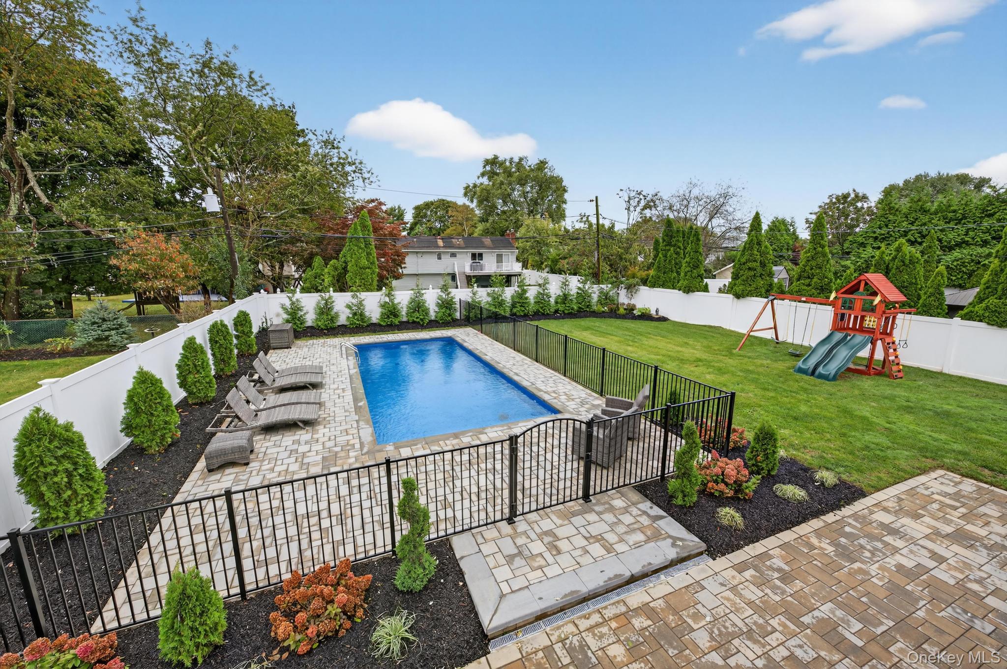 12 Farmstead Road Commack, NY 11725 - Photo 28 of 28 a view of a terrace with a garden