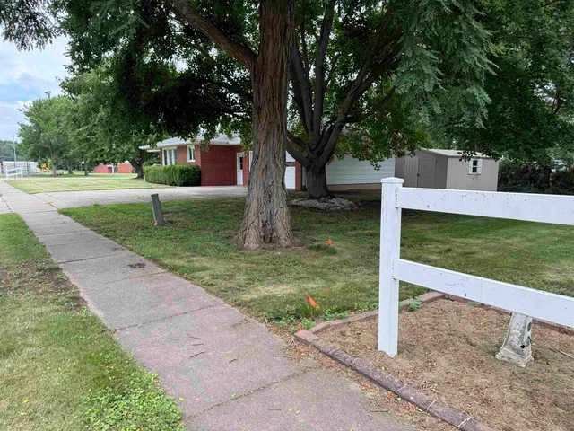 a garden view with a fountain
