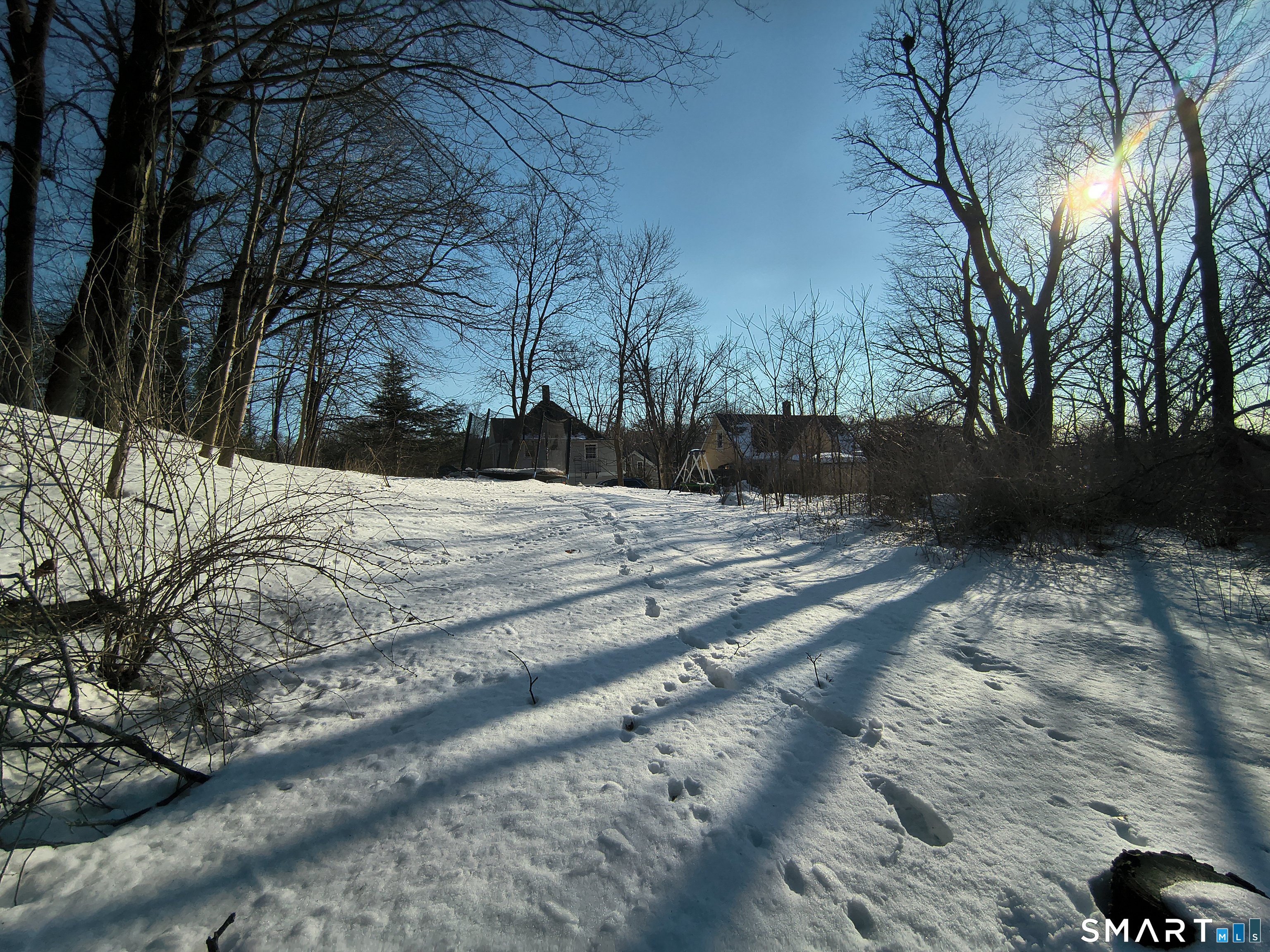 70 Walnut Street Putnam, CT 06260 - Photo 20 of 20 a view of snow on the side of a road