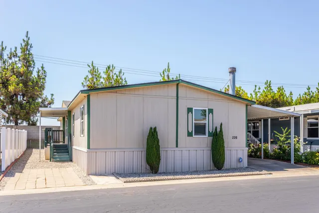 a view of a house with a garden