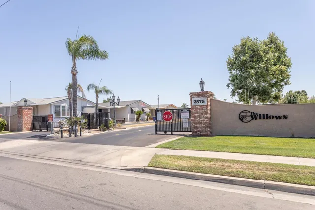 a view of street with tall buildings