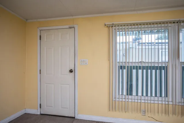 a view of a door with a small door