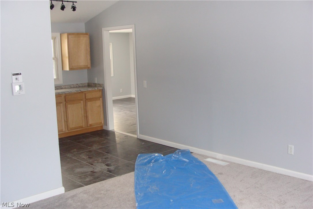 3008 Polly Road Ravenna, OH 44266 - Photo 6 of 27 View of Living room looking into eat in Kitchen from front door