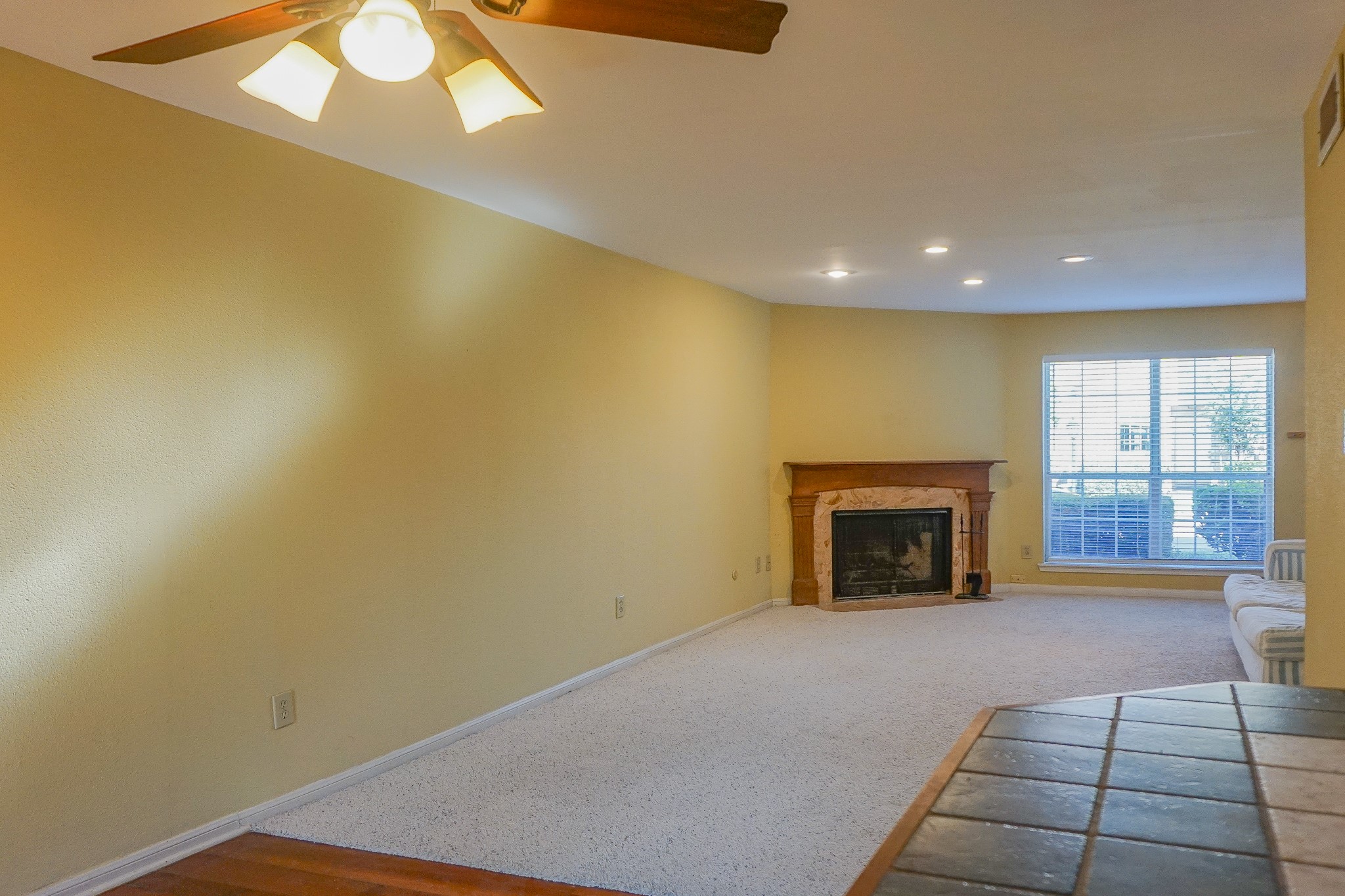 3100 Jeanetta Street, Unit 703 Houston, TX 77063 - Photo 17 of 42 an empty room with a fireplace