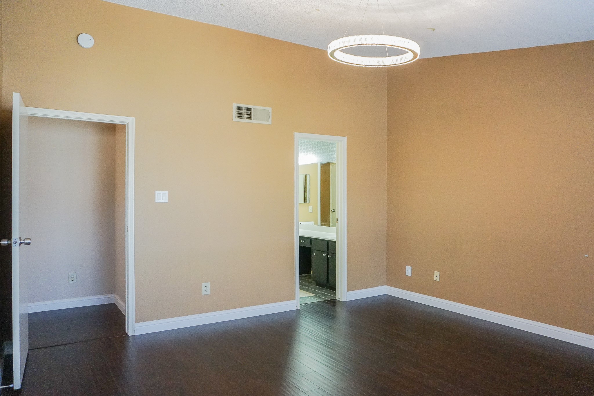 3100 Jeanetta Street, Unit 703 Houston, TX 77063 - Photo 25 of 42 an empty room with wooden floor and natural light