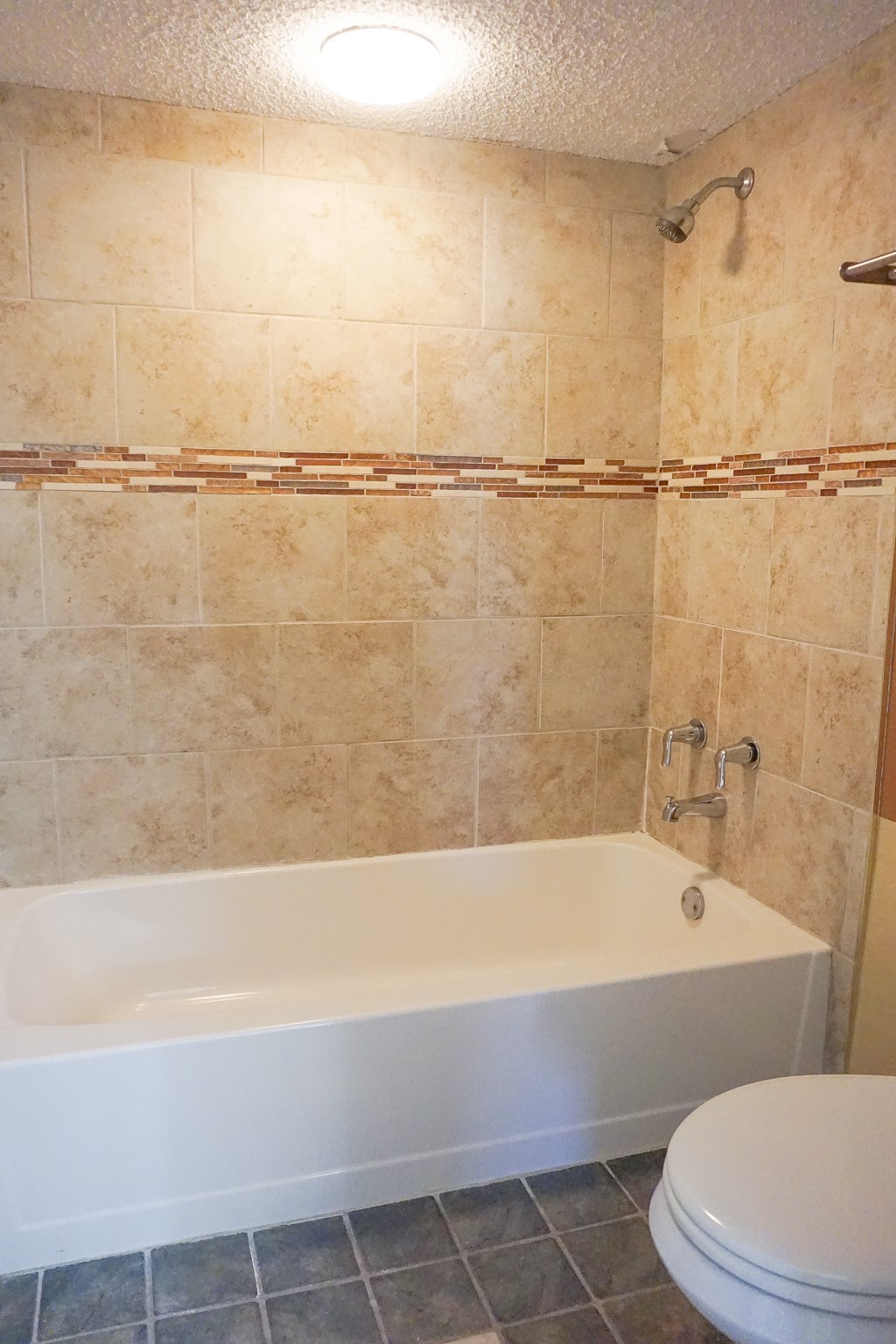 3100 Jeanetta Street, Unit 703 Houston, TX 77063 - Photo 27 of 42 a bathroom with a bathtub and shower