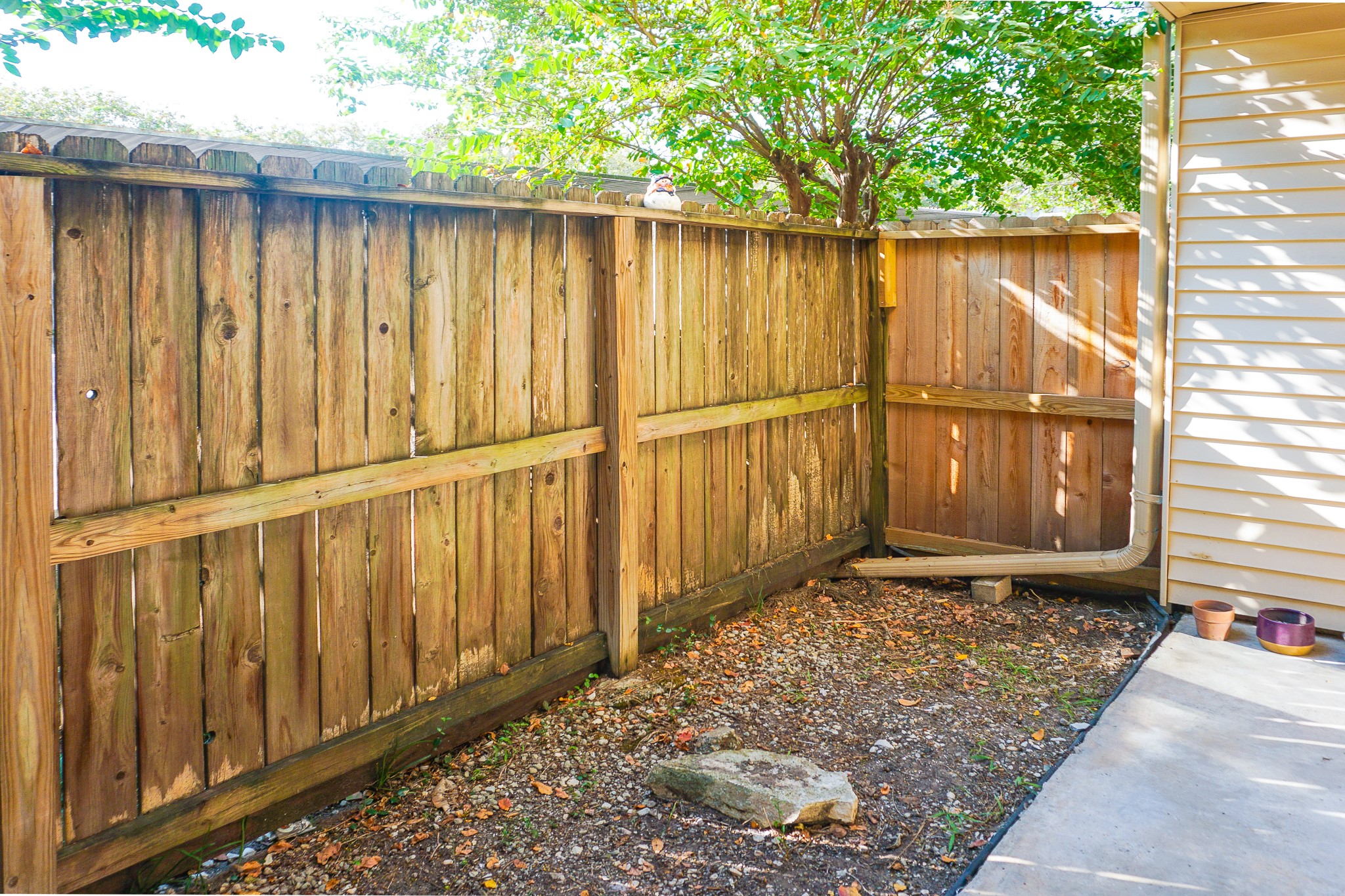 3100 Jeanetta Street, Unit 703 Houston, TX 77063 - Photo 32 of 42 a view of a wooden fence