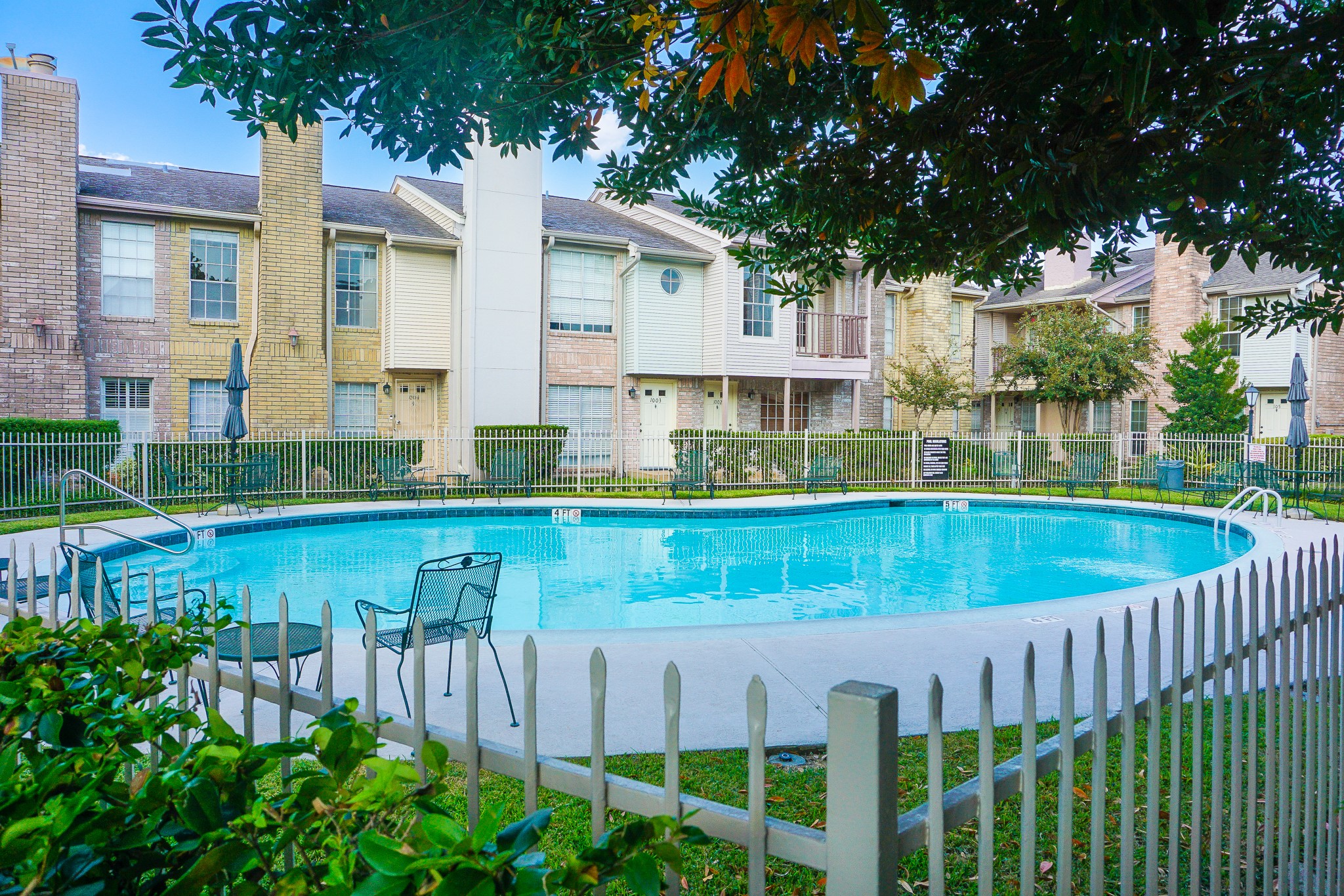 3100 Jeanetta Street, Unit 703 Houston, TX 77063 - Photo 38 of 42 a view of a house with a yard