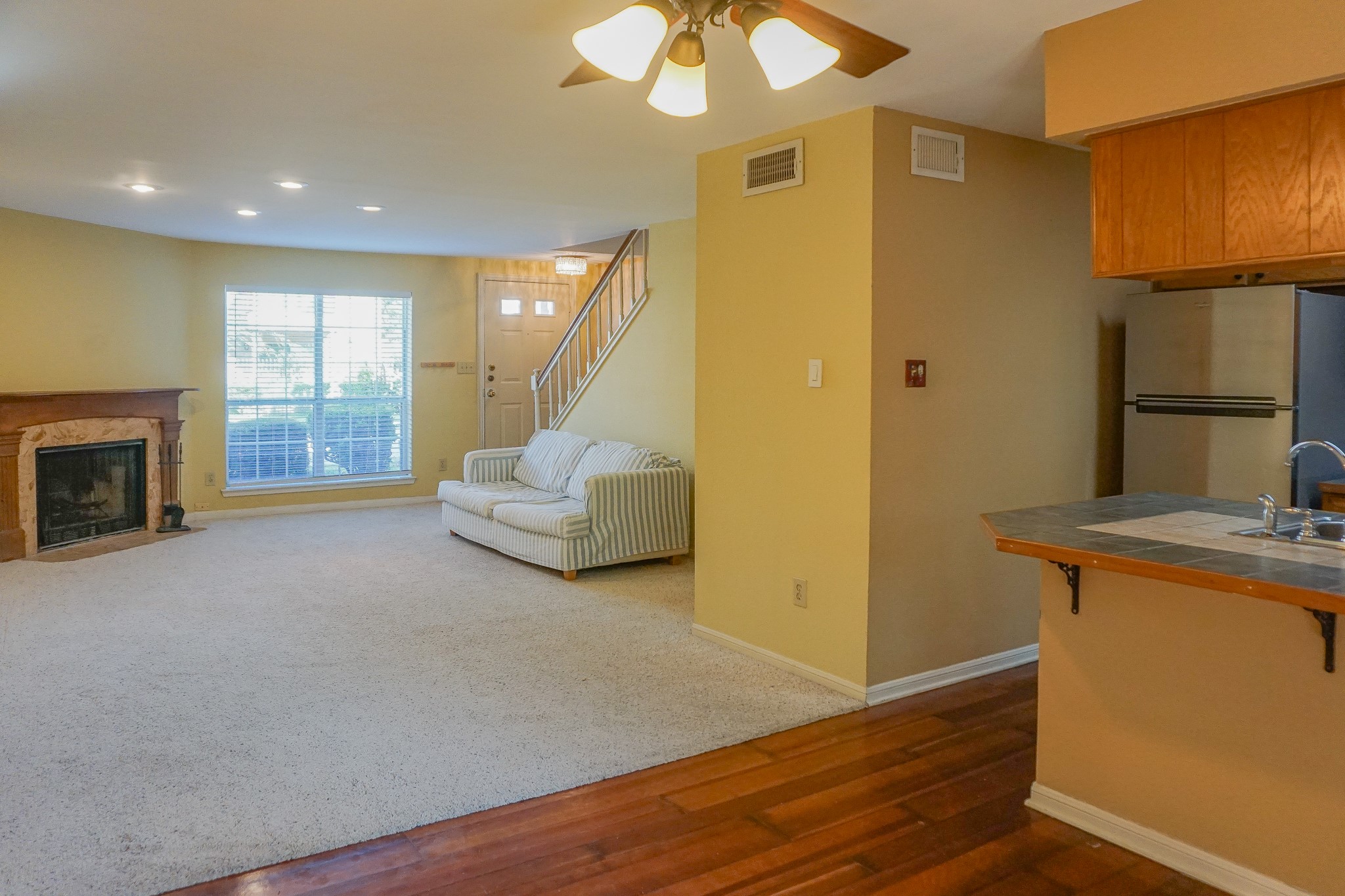3100 Jeanetta Street, Unit 703 Houston, TX 77063 - Photo 9 of 42 a living room with furniture and a fireplace