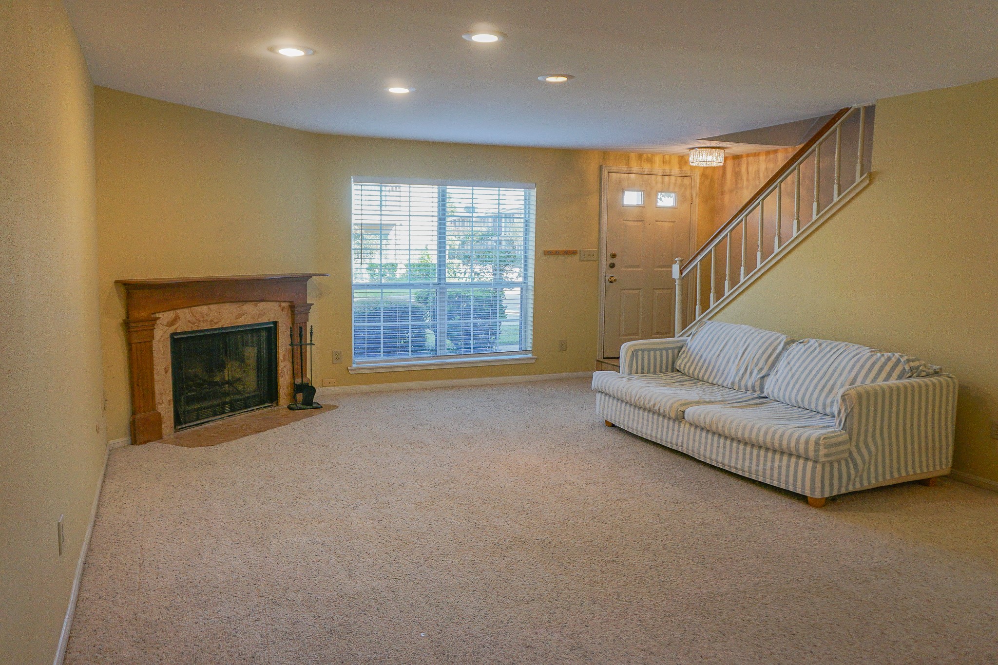3100 Jeanetta Street, Unit 703 Houston, TX 77063 - Photo 10 of 42 a living room with furniture and a fireplace