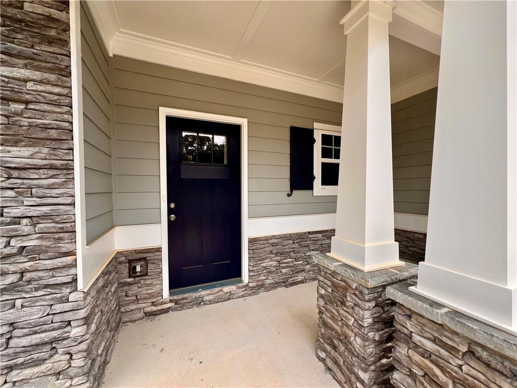 279 Adventure Trail Jefferson, GA 30549 - Photo 2 of 54 a front view of a house with parking