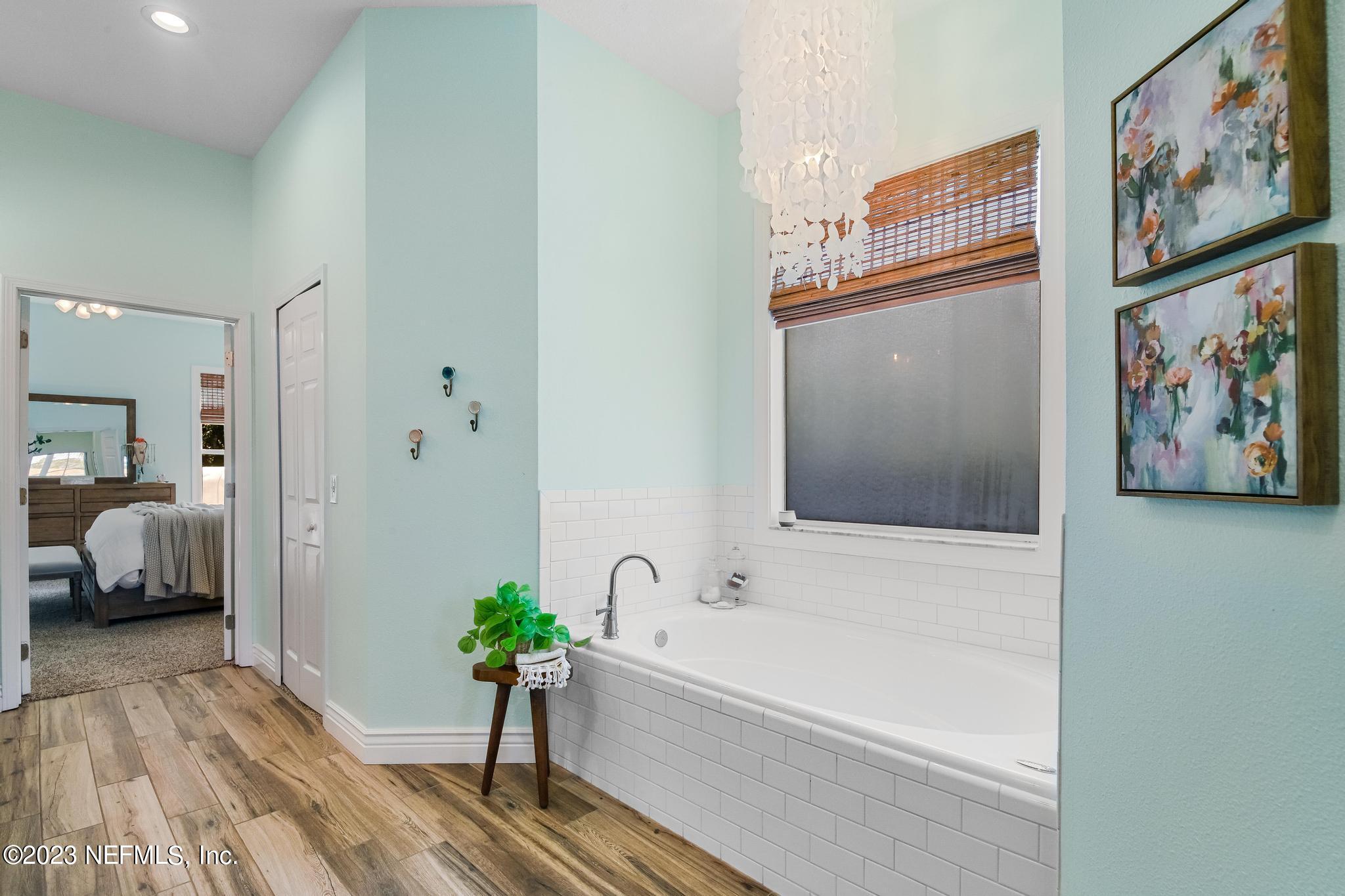 3926 Danforth Drive West Jacksonville, FL 32224 - Photo 16 of 35 a bathroom with a bathtub and a view of bathroom